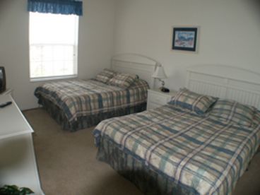 2nd bedroom with two queen sized beds