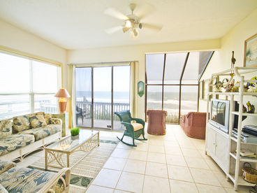 Living room with ocean front views through the sliding doors
