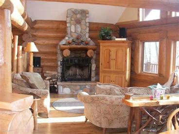 great room and fireplace from dining room