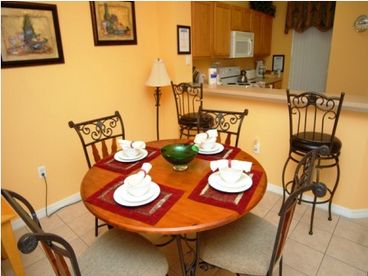 The Dining Area is well furnished with a dining table with all place settings waiting for your gourmet meals to be served.
