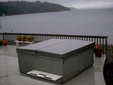 Hot tub on deck overlooking hood canal.