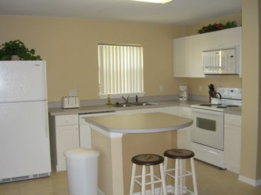 Kitchen area  with two seat countertop