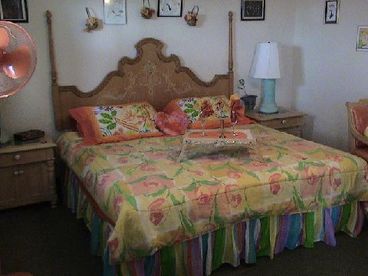 Gorgeous king bedroom with beautiful Ty Wilson artwork.