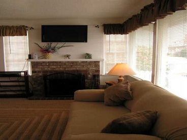 Living Room 3BR/3BA House #1, fireplace, flat screen TV.