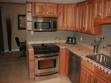 Kitchen comes equipped with pots and pans, utensils, coffee pot, blender and toaster 