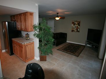 Here is a photo from dining area looking into both living room and kitchen