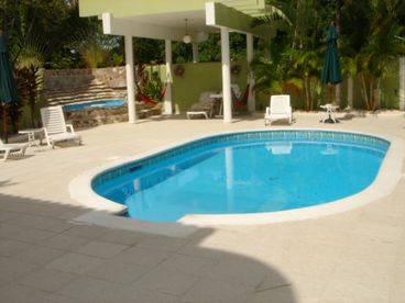 Pool area jacuzzi massage area with hammocks