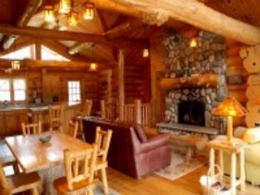 Get cozy around the fieldstone wood burning fireplace, we provide the wood.