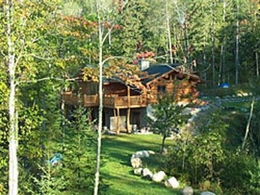 Summer photo of house and yard