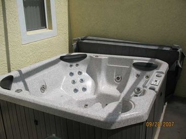 Hot tub for your use while you visit. It is filled with fresh water for each new guest.
