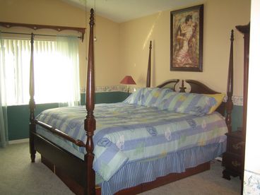 Relax in the King Master Suite with private bath and walk-in closet