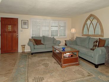 Formal living room, dining room combination.