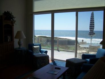 Living area out to oceanfront deck. Beautiful ocean views