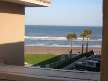 Our townhouse is located right on the beach.  This is the view from our building.  This is the view from the Master Bedroom window looking right.