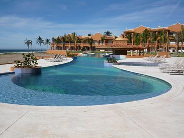 Pool Deck - Pool and Hot Tub-  Our Condo is in the building on the right- Top Floor- 3rd Floor