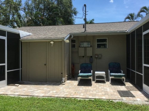 Back sunning are next to washer & Dryer in small building