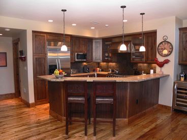 Gourmet kitchen with breakfast bar