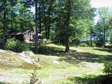 Partial view of property and the cottage. 