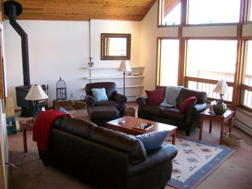 Living Room with Panoramic Views, wood-burning stove.