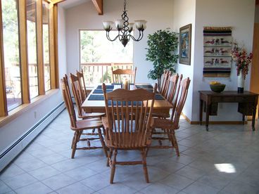 Huge Dining Room table will accomodate up to twelve people.