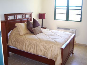 Master Bedroom with queen-sized bed and private bath