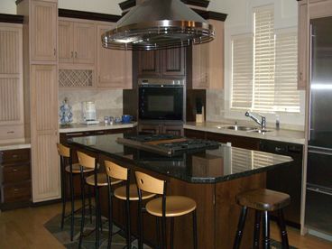 Designer Kitchen with Island Seating for 6.  Additional Home Office and file drawers to the right.