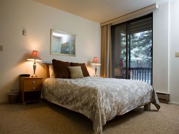 Master bedroom with queen bed