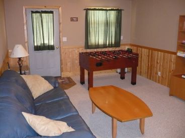 Room includes queen sleeper, futon, foosball table, 42\