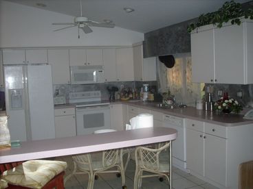 Spacious, modern kitchen with plenty of cabinet space.  Complete with pots, pans, silverware, and dishes.
