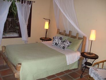 One of the Hacienda\\\\\\\'s 4 bedrooms, all beds come supplied with fine linens and mosquito netting.
