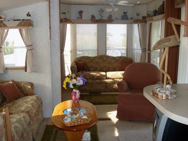 Living Room into 2nd Sofa Bed area which has sliding door for privacy.