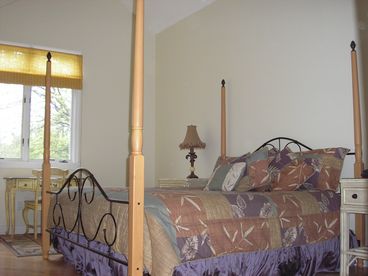 Master bedroom upstairs with king bed and private bath.