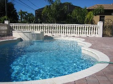 Heated pool with spa