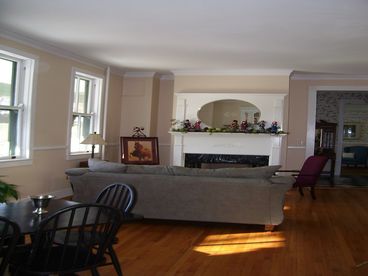 14-ft ceilings, hardwood and marble floors, and three gas log fireplaces (living, den & recreation room)!  