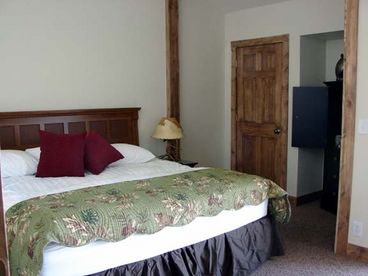 Grand Master Suite; with upscale king, tv/dvd, wifi, gas fireplace, seating, balcony with views. 