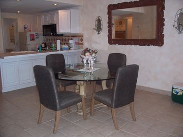 Large dining room table seats 6 plus there are 3 bar stools -seating for 9!