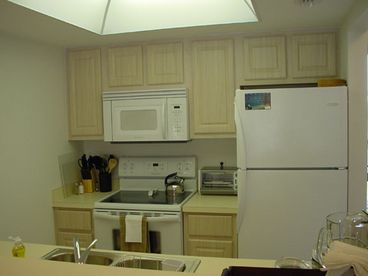 The finely appointed kitchen has everything you need!  Just pick up your groceries at the grocery store just down the street!