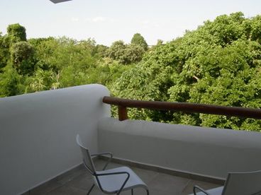 Private terrace from the master bedroom has beautiful jungle views - watch the sunset over the tree tops