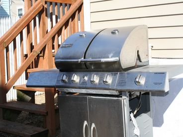 grill out on the large gas grill and hang out in the charming backyard 