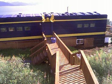 Moose Caboose, main entrance. Large deck and windows on the other (Bay side).
