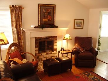 Enjoy the charming fireside setting, leather and willow furnishings.