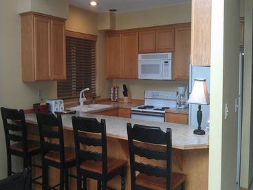 Kitchen with everything you\'ll need, even a waffle maker!