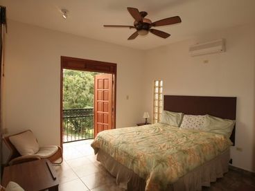 King sized bed with a/c, fan and private two sink bath room. 