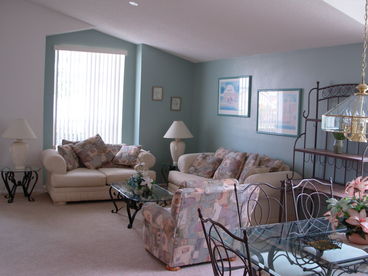 Combination living room and dining room for when more space is needed for large groups.