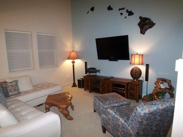 Two storey living room with ocean views