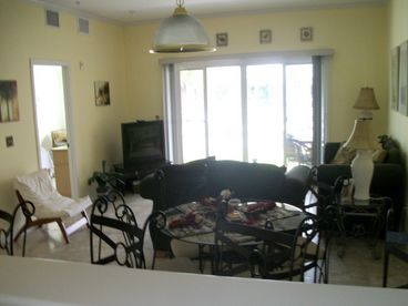 Living/Dining Area with view of pool