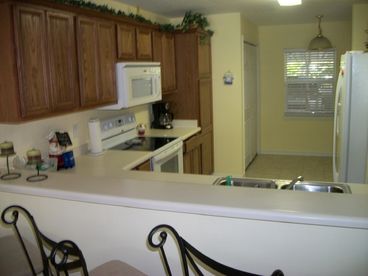 Fully Equipped Kitchen with eat-in bar