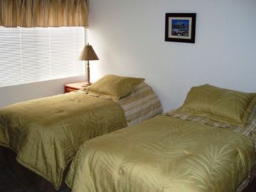 Two twin beds, large room length closet, fan, alarm clock
Ocean View!