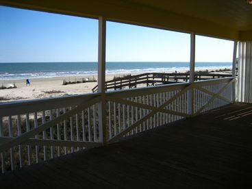 View of the Beach from the deck of Trade Winds.  You can see the privacy screen on the right side of the picture.  This will provide more privacy from the house next door (Summer Winds).
