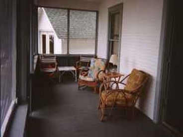 Great porch that is screened in and you can enjoy the sunrise and sunset of Lake Michigan on which this porch gazes upon.